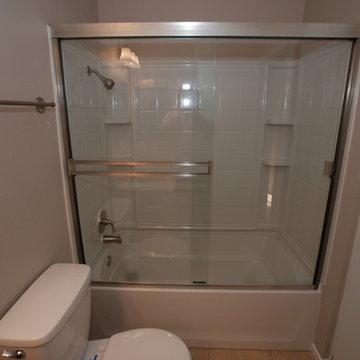 Fiberglass 4 piece combo tub/shower with Brushed Nickel Fixtures