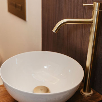 Beautiful modern vintage bathroom with wood accents