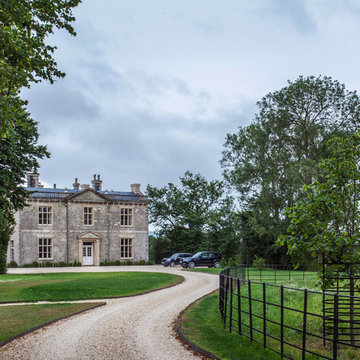 The refurbished front and driveway