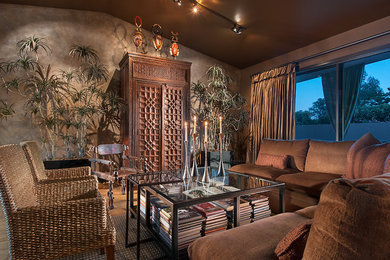 Inspiration for a large transitional open concept light wood floor and brown floor family room remodel with brown walls