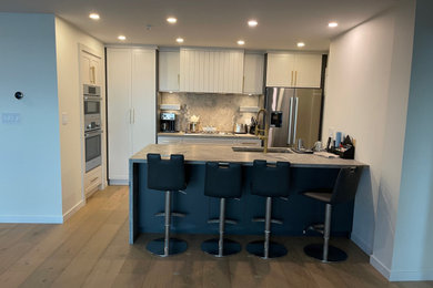 Kitchen photo in Vancouver with quartzite countertops