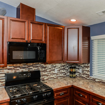 Cherry Raised Panel Kitchen Cabinets