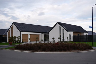 Photo of a modern home design in Christchurch.