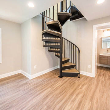 Basement Renovation - Spiral Staircase, Waterfall Countertop and Wine Storage