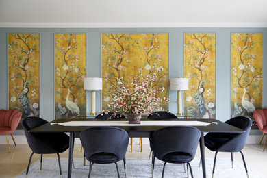 Design ideas for a large world-inspired enclosed dining room in London with limestone flooring and panelled walls.