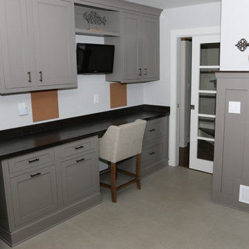 Custom Built-in Home Office Desk with Grey Cabinets and Stained Countertop
