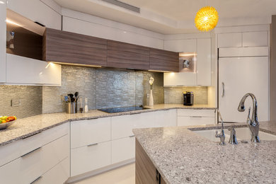Mid-sized trendy u-shaped porcelain tile kitchen pantry photo in Denver with an undermount sink, flat-panel cabinets, white cabinets, quartz countertops, gray backsplash, glass sheet backsplash, paneled appliances and an island