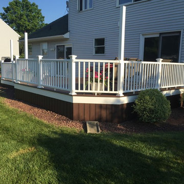 Trex Transcend decking, Picture frame, white trim, vinyl railings