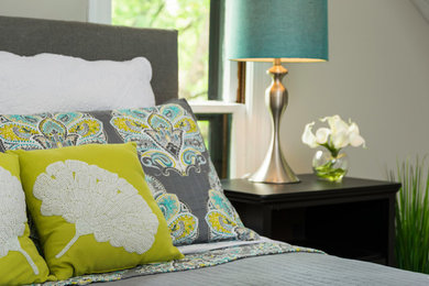 Example of a mid-sized trendy master carpeted and beige floor bedroom design in St Louis with gray walls and no fireplace