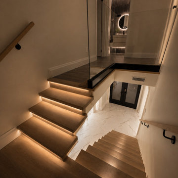 Floating Staircase with Integrated LED Lighting
