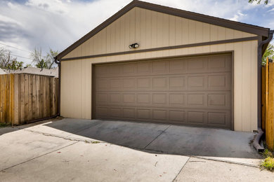 Garage - large craftsman detached two-car garage idea in Denver