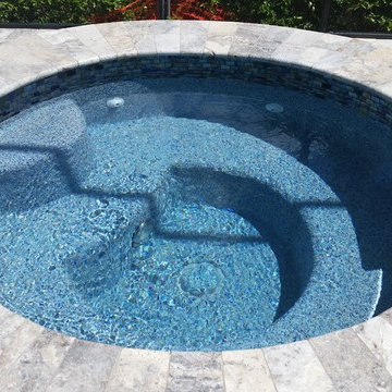 Glacier Travertine Deck and Glass tile on Pool