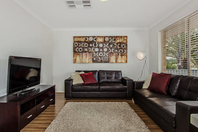 Design ideas for a modern living room in Perth.