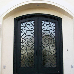 Entry Iron Door and Wall Sconces - Front Doors