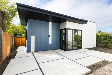 Mid-sized trendy blue one-story concrete fiberboard exterior home photo in San Francisco