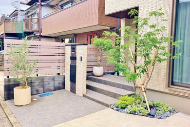コンクリート舗装の駐車場まわりの修景