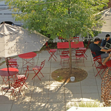 Concrete Scoring and Patio Design Elements Add a Human Scale to the Space