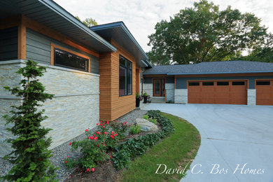 Inspiration for a contemporary exterior home remodel in Grand Rapids