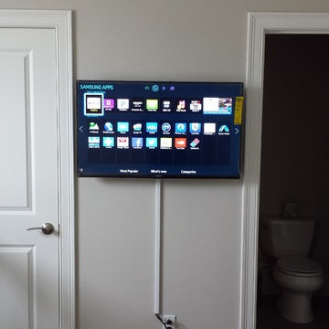 TV hang between doors
