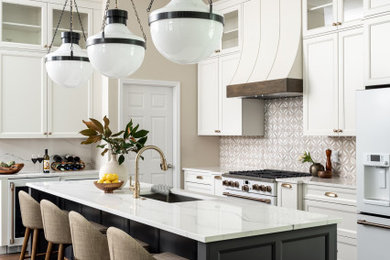 Inspiration for a transitional porcelain tile kitchen remodel in Tampa with white cabinets, quartz countertops, beige backsplash, travertine backsplash, white appliances, an island and white countertops