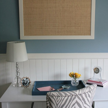White frame with a navy initial bulletin board