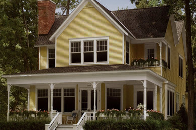 Home design - large traditional home design idea in Louisville