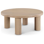 Meridian Furniture - Hayden Coffee Table, Natural - Immerse your living space in the captivating allure of the Hayden Natural Oak Coffee Table. This exquisite centerpiece seamlessly blends a rich black finish, emblematic of timeless elegance, with the dynamic texture of fluted wood. Crafted from solid wood for enduring quality, the table exudes an aura of sophistication that complements both modern and traditional decors. The unique design elements play with light and shadow, creating a captivating interplay of depth and dimension that elevates the table from mere furniture to a conversation-starting work of art. Beyond its captivating aesthetics lies unwavering functionality, making it ideal for everyday use
