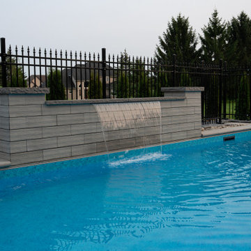 Rectangular Pool with Sheer Descent Water Wall & Automatic Safety Cover — Estate