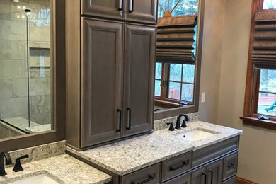Large elegant master mosaic tile porcelain tile bathroom photo in Other with beige walls