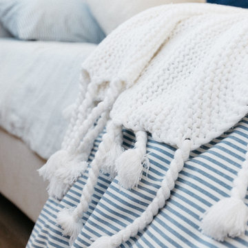 Knit Throw on Blue Ticking Striped Bedding