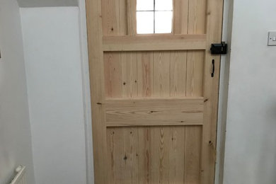 This is an example of a traditional entrance in Sussex with a single front door.