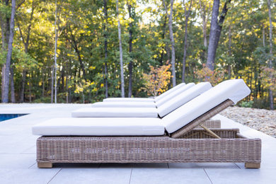 Large backyard rectangular pool photo in Atlanta with decking