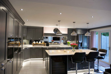 This is an example of a contemporary kitchen in West Midlands.