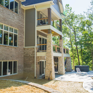 Two Story Stone Home with Great Outdoor Living Space