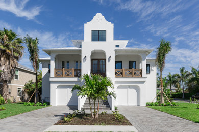 Example of a tuscan exterior home design in Tampa