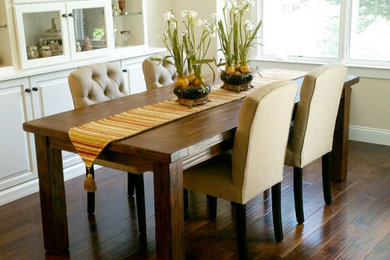 Great room - large transitional dark wood floor and brown floor great room idea in San Luis Obispo with beige walls and no fireplace