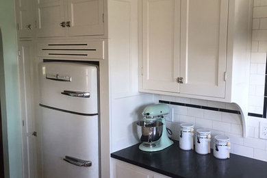 Example of a 1960s kitchen design in Cleveland