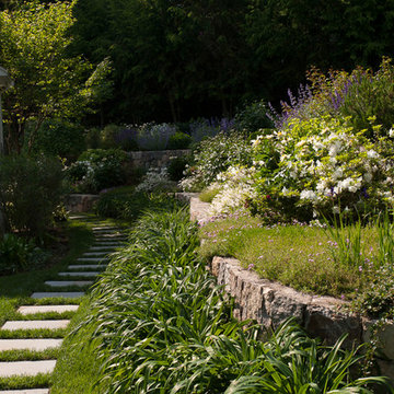 Pathway alongside terraced garden beds