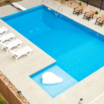 Rectangular inground vinyl liner pool with corner steps, tanning ledge and dive!