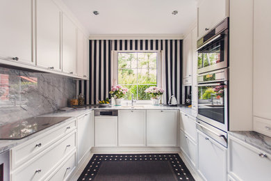 Inspiration for a mid-sized timeless u-shaped kitchen remodel in Other with an undermount sink, recessed-panel cabinets, white cabinets and no island
