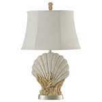 StyleCraft Home Collection - Avoca Beach | Coastal Sheel Table Lamp - A fun and whimsical favorite, the modern Acova Beach table lamp captures the playful sensibility of SoCal decor. Made with a multi-tone bronze, cream, and gold leaf finish base, this lamp takes a classic profile and gives it new definition. It's topped off with a round fabric hardback shade to give it a complete look and feel.