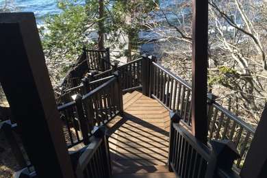 Deck - mid-sized transitional backyard deck idea in Other with no cover