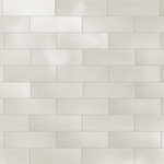Merola Tile - Coco Glossy Cloud White Porcelain Wall Tile - Offering a subway look, our Coco Glossy Cloud White Porcelain Wall Tile features a smooth, glossy finish, providing decorative appeal that adapts to a variety of stylistic contexts. Containing 100 different print variations that are randomly distributed throughout each case, this white rectangle tile offers a one-of-a-kind look. With its impervious, frost-resistant features, this tile is an ideal selection for both indoor and outdoor commercial and residential installations, including kitchens, bathrooms, backsplashes, showers, hallways and fireplace facades. This tile is a perfect choice on its own or paired with other products in the Coco Collection. Tile is the better choice for your space!