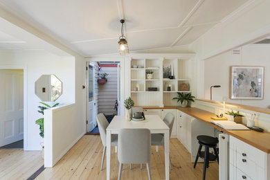 Inspiration for a small transitional dining room in Sydney.