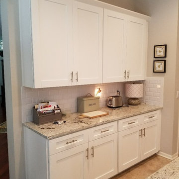 Modern Kitchen Remodel Done in a Snow White Laminate