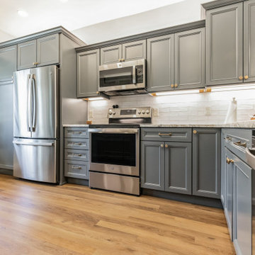 Kingswood Craftsman | Modin Rigid LVP Collection Scandinavian Customer Space |OH