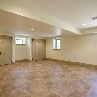 Inspiration for a large classic walk-out basement in Philadelphia with beige walls, no fireplace and lino flooring.
