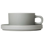 blomus - Pilar Tea Cups With Saucers, Set of 2, 6 oz, Mirage Gray - Tea Cups with Saucers are functional for every occasion. Make the tea twice as tasty with this set of 2. The PILAR tea cup and saucer has what it takes to become a favorite accessory for tea lovers. Beautifully shaped yet humble enough to act as a discreet backdrop to the perfectly arranged meal. The new PILAR tableware collection was designed by Floz Design in Germany. Stoneware pieces include bowls, plates, mugs and serve ware. The full range comes in three matching colors: moonbeam, agave green and mirage gray. Start setting the table with your own unique color combinations. Outside of stoneware is matte. Inside serving area is glazed for design compliment and easy cleaning. PILAR stoneware is manufactured from clay, quartz and minerals such as calcite and is defined as a ceramic product. The stoneware is molded at very high temperatures using casting techniques. The high temperatures during the firing process make stoneware more stable than clay and less translucent than porcelain. Due to the heating and glazing processes of stoneware, these pieces may have slightly different attributes which can add to their beauty and uniqueness.