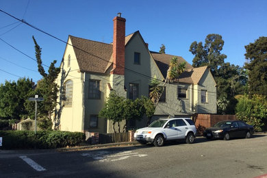 Photo of a mid-sized arts and crafts three-storey stucco beige exterior in San Francisco with a gable roof.