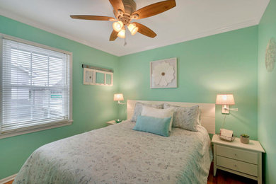 Example of a beach style bedroom design in Other